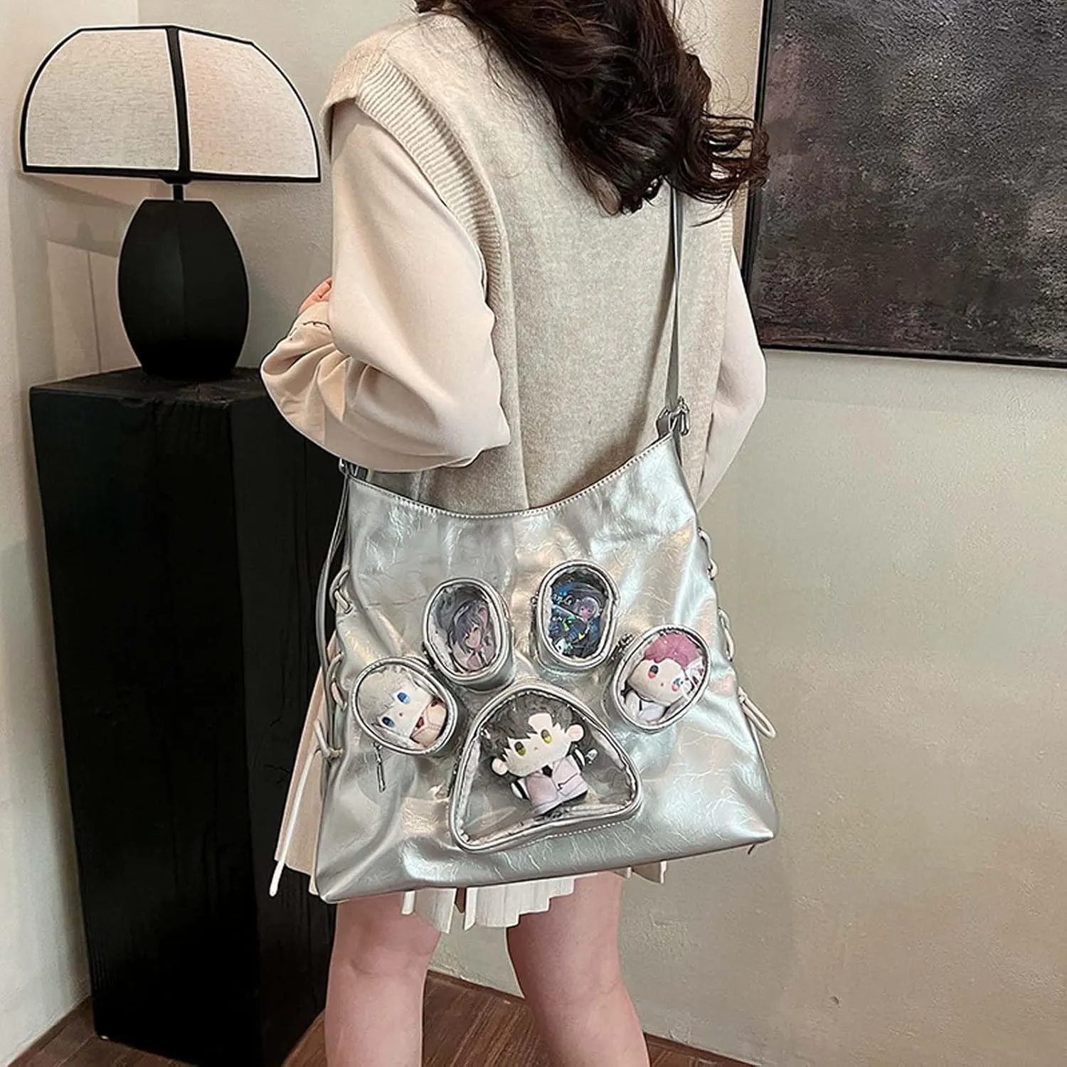 Cute cat paw shaped shoulder bag with large capacity for women, featuring a transparent doll display window