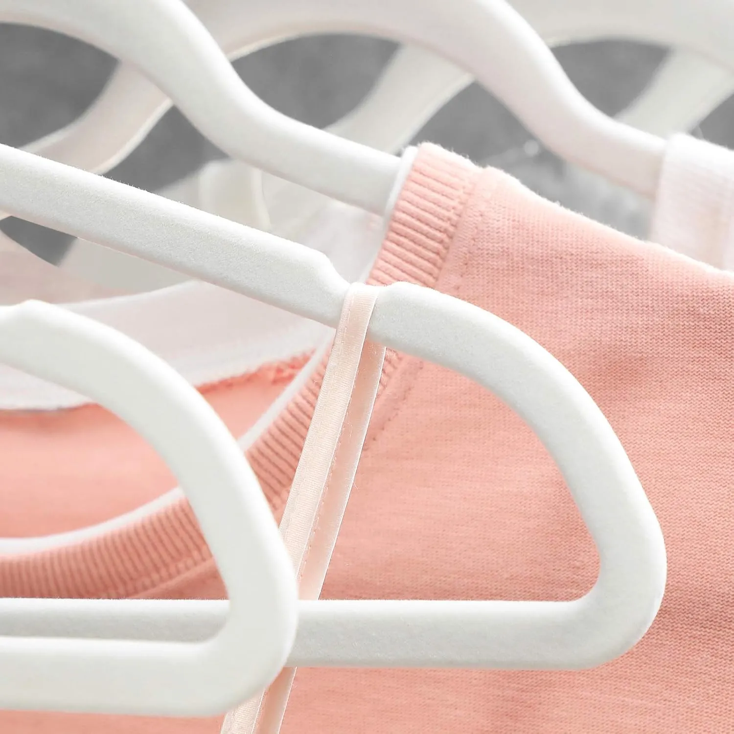 SONGMICS Velvet Hangers 50 Pack, Non-Slip With Rose Gold-Colored Swivel Hooks, Slim Space-Saving for Closet, Heavy-Duty, White UCRF026W03