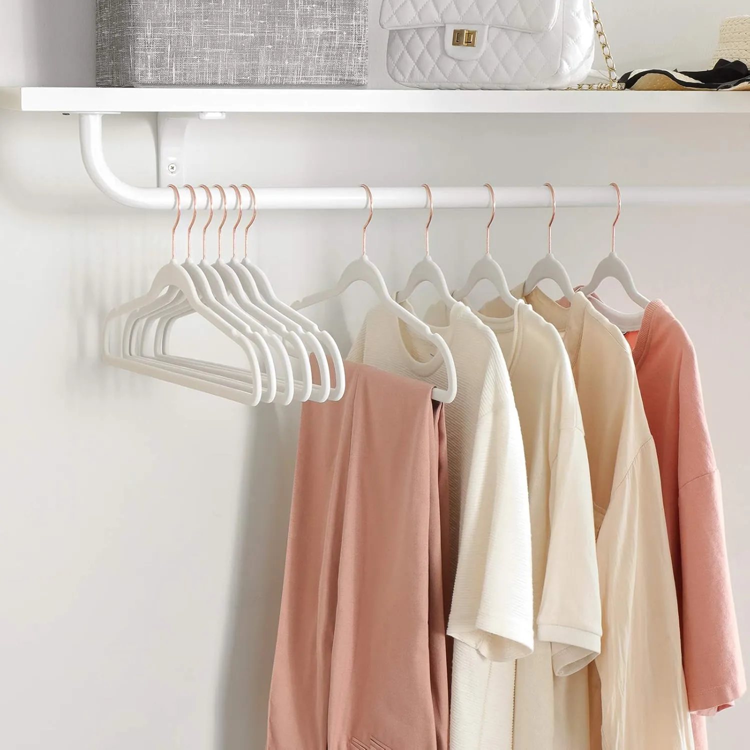 SONGMICS Velvet Hangers 50 Pack, Non-Slip With Rose Gold-Colored Swivel Hooks, Slim Space-Saving for Closet, Heavy-Duty, White UCRF026W03